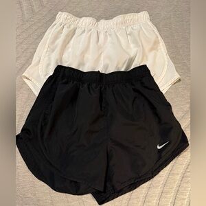 2 pair Nike Women's Athletic Shorts with built in liner. Medium Run Walk